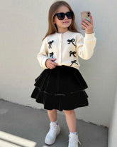 Girls Bow Decor Round Neck Long Sleeve Apricot Cardigan And Skirt