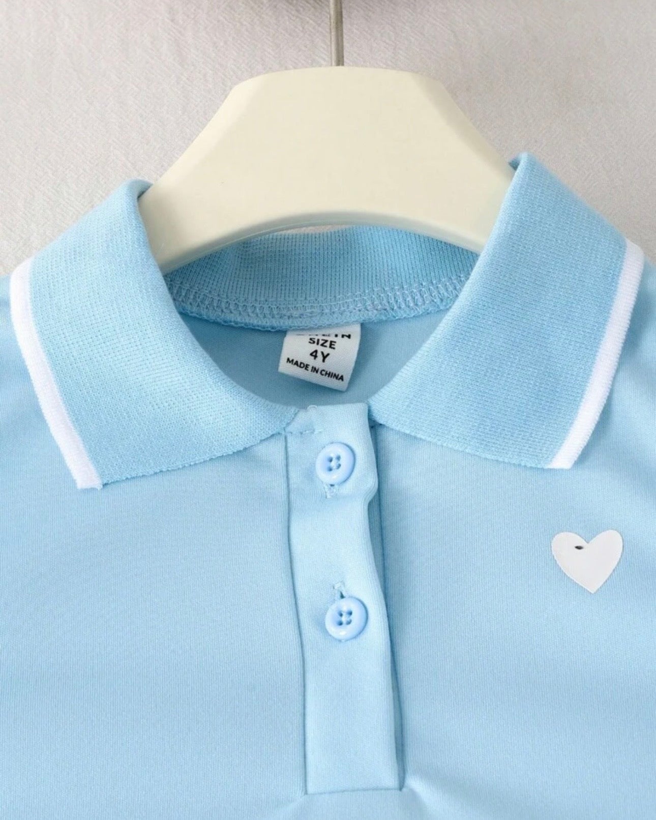 Girls Light Blue Heart Print Outfit Set – Sleeveless Polo Shirt & Pleated Skirt