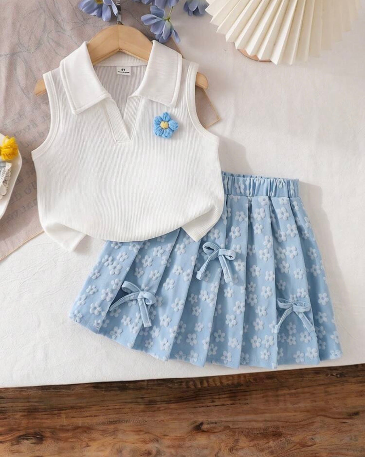 Girls Light Blue Floral Outfit Set – Sleeveless Polo Shirt & Pleated Skirt